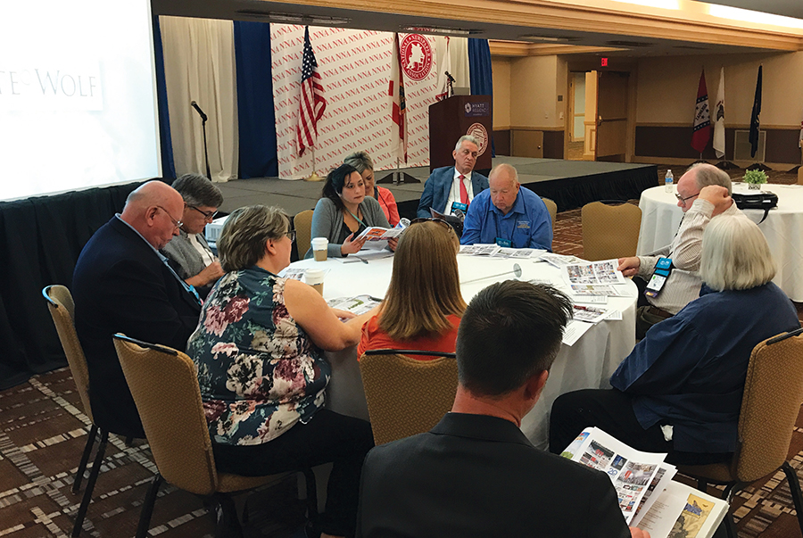 Peter Wagner (far right), owner of The N`West Iowa REVIEW in Sheldon, Iowa, presents a flash session on “New Pages, Programs and Ideas to Create Increased Revenue.” Check back next month for Wagner's write up on the session.