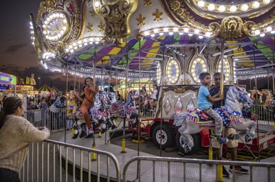 Families enjoy a midway ride on Wednesday, October 25, the opening day of the Williamson County Fair and Rodeo, held at the Williamson County Expo Center through October 28. (Date of publication: Oct. 29, 2023) (Andy Sharp, Williamson County Sun, Sunday Sun, Georgetown, Texas)