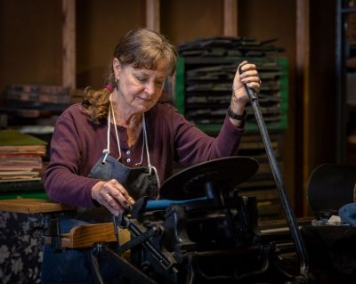 Rebecca Lawyer operates her vintage Chandler and Price Pilot tabletop press, which still works like a charm. Rebecca Lawyer operates her vintage Chandler and Price Pilot tabletop press, which still works like a charm.