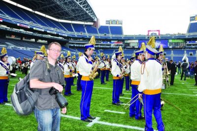 Sequim Gazette Editor Michael Dashiell covers the Sequim High School band’s participation at Husky Band Day in Seattle in 2016. (Photo by Patsene Dashiell) Sequim Gazette Editor Michael Dashiell covers the Sequim High School band’s participation at Husky Band Day in Seattle in 2016. (Photo by Patsene Dashiell)