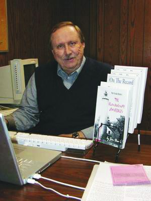 Iosco County News-Herald and Oscoda (Michigan) Press Former Publisher Jim Dunn pictured with a few volumes of his various literary projects. The journalist, who worked for more than 40 years in Iosco County, recently passed away. Iosco County News-Herald and Oscoda (Michigan) Press Former Publisher Jim Dunn pictured with a few volumes of his various literary projects. The journalist, who worked for more than 40 years in Iosco County, recently passed away.