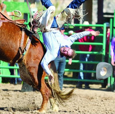 Richard Johnson  | Wickenburg (Arizona) Sun
(Right) Chance West has some tough luck during the saddle bronc riding at the Gold Rush Days Rodeo.