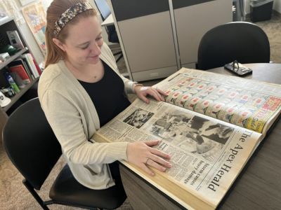Kerrin Cox, communications coordinator for the town of Apex, struck gold in the bound volumes of The Apex Herald when she needed local history to tell the town’s story for its 150th anniversary. Kerrin Cox, communications coordinator for the town of Apex, struck gold in the bound volumes of The Apex Herald when she needed local history to tell the town’s story for its 150th anniversary.