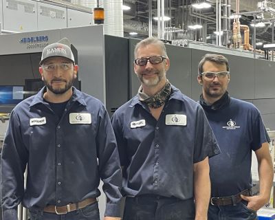 Fort Dearborn Company – FTW team members from left to right: Press operators Rosendo Pozos and Brent Baldwin and maintenance technician Mike Suarez