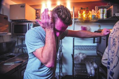 Mike Howell, owner of Howell’s Sandwich Co., tears up as he closes his shop to the public on March 20. Restaurants and shops like Howell’s have had to shut their doors and lay off employees to stop the spread of the coronavirus. Doing their part to help prevent the public health crisis comes with a price for local business owners who don’t know how they will survive financially. (Lloyd Mullen | Port Townsend (Washington) and Jefferson County Leader) Mike Howell, owner of Howell’s Sandwich Co., tears up as he closes his shop to the public on March 20. Restaurants and shops like Howell’s have had to shut their doors and lay off employees to stop the spread of the coronavirus. Doing their part to help prevent the public health crisis comes with a price for local business owners who don’t know how they will survive financially. (Lloyd Mullen | Port Townsend (Washington) and Jefferson County Leader)