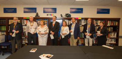 Ray Prince (fourth from left) participates in a ceremony with industry and education leaders dedicating the Raymond J. Prince Graphic Arts Collection at Cal Poly. Ray Prince (fourth from left) participates in a ceremony with industry and education leaders dedicating the Raymond J. Prince Graphic Arts Collection at Cal Poly.