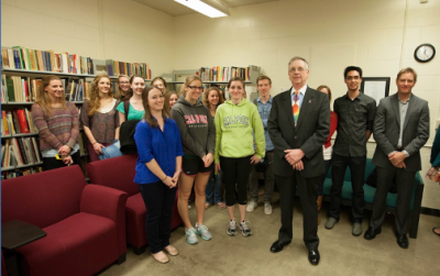 Ray Prince with several graphic communication students in one of the many rooms representing the Raymond J. Prince Graphic Arts Collection.