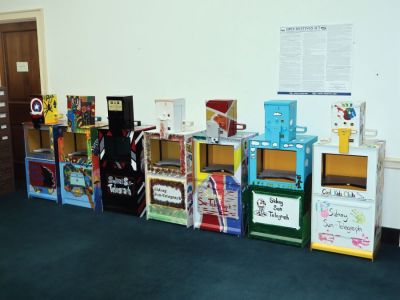 In February, the Sun-Telegraph, Keep Sidney Beautiful, and the Sidney Public Library partnered with five public schools to decorate newspaper vending machines that were going to be discarded because they had outdated logos. Rather than get rid of or sell them, two machines were dropped off at the participating schools for students to decorate and “upcycle” in their own styles. Area residents were encouraged to “vote” for the best from each school. Each vote costs $2, and the participating schools kept the money raised by their machines votes. After the fundraiser, the machines will be placed out in the local communities for people to enjoy. (Photo courtesy of Sidney Sun-Telegraph) In February, the Sun-Telegraph, Keep Sidney Beautiful, and the Sidney Public Library partnered with five public schools to decorate newspaper vending machines that were going to be discarded because they had outdated logos. Rather than get rid of or sell them, two machines were dropped off at the participating schools for students to decorate and “upcycle” in their own styles. Area residents were encouraged to “vote” for the best from each school. Each vote costs $2, and the participating schools kept the money raised by their machines votes. After the fundraiser, the machines will be placed out in the local communities for people to enjoy. (Photo courtesy of Sidney Sun-Telegraph)