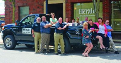 Staff of The Barberton (Ohio) Herald is pictured outside the office building in 2016. Staff of The Barberton (Ohio) Herald is pictured outside the office building in 2016.