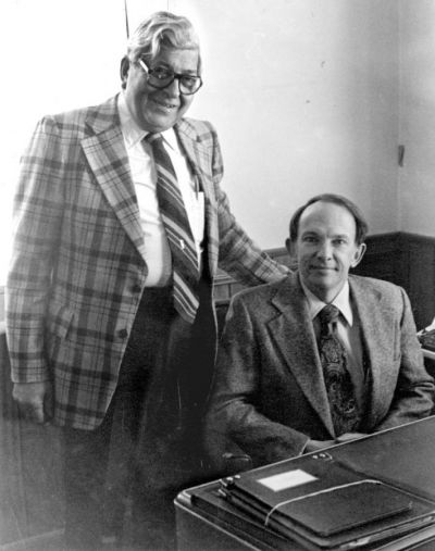 Early editor/publisher Bill Klaber (left) and Kit Cone, Jennifer’s father, in 1980, when he bought the paper from Klaber after working for the newspaper for many years.