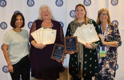 NNA Chair Martha Diaz Aszkenazy, publisher, The San Fernando Valley (California) Sun; Beth Cornish, The Henderson (Minnesota) Independent; Rachel Miller, publisher, The Henderson (Minnesota) Independent; and NNA Executive Director Lynne Lance celebrate Better Newspaper Contest winners at the Friday evening event.
