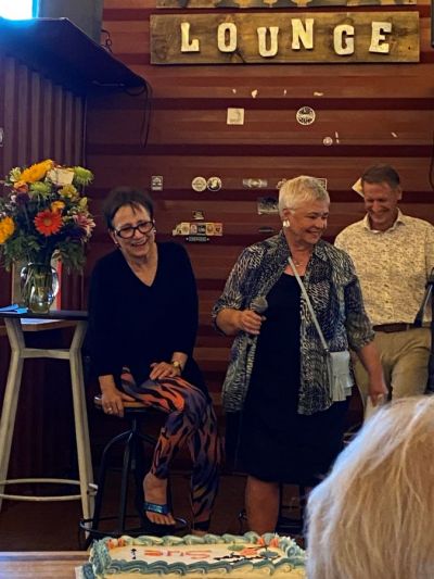 Sue Orsen is pictured on stage at The Victoria Burrow being toasted and roasted (with friends Nan Emmer and John Mugford, former editor of the Chanhassen Villager). Sue Orsen is pictured on stage at The Victoria Burrow being toasted and roasted (with friends Nan Emmer and John Mugford, former editor of the Chanhassen Villager).