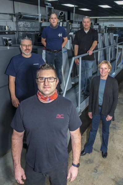 FRONT: Randy Ritzen – Pressman, West Press; BACK LEFT TO RIGHT: Eric Rankin – Pressman, West Press, John Pratt – Pressroom Supervisor, West Press, Kevin Stroh – Production Manager, West Press, Kristy Scharf – President, West Press